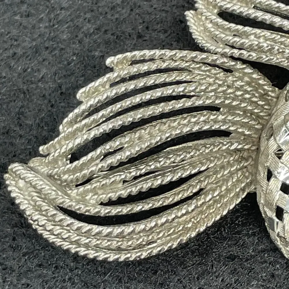 BSK Vintage Brooch Silver Tone Metal Openwork Ring With Textured Rope Spray